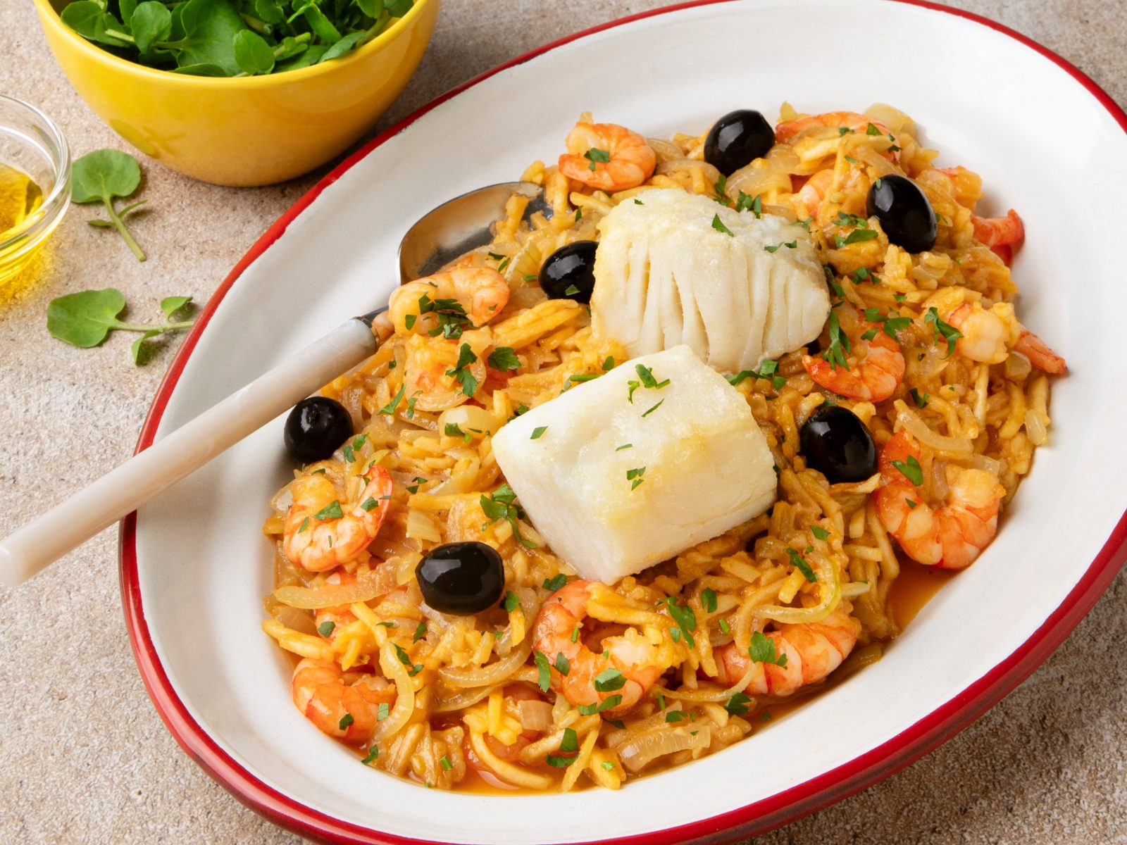 imagem de Lombo de bacalhau, brás de camarão e agrião
